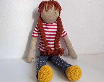 Large rag doll, with chestnut brown braids.