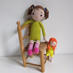 Cute girl doll with clothes and a small doll. image 6