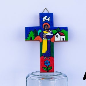 &quot;Christ the Good Shepherd&quot; cross made of wood and hand-painted in El Salvador. Measurements are detailed.