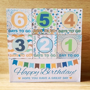 May include: A printable birthday countdown box set with colorful patterned squares featuring the numbers 1 through 6 with the text "Days to go" or "Day to go". The bottom square has the text "Happy Birthday! Hope you have a great day".