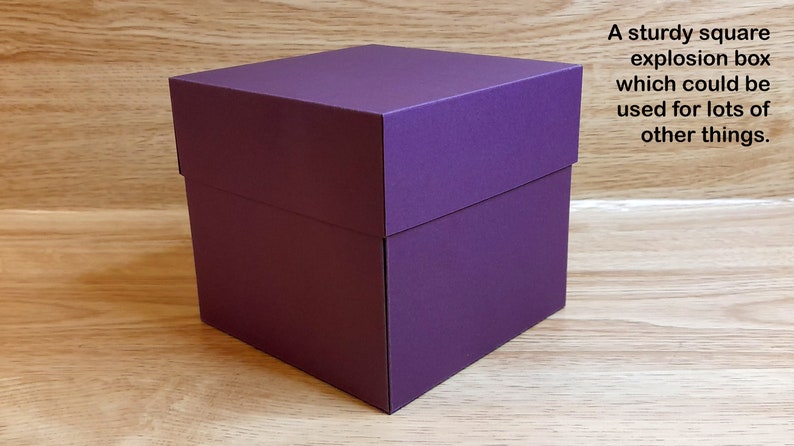 May include: A purple square explosion box. This box is made of sturdy cardboard and can be used for a variety of purposes.