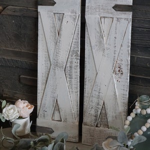 2 barn door  X shutters wall sconces light weight thin wood  23'' tall with fake cardboard hinges