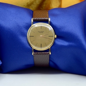Patek Philippe Genève 18K Yellow Gold Watch
