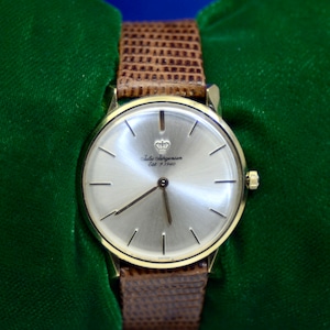 Vintage Mathey Tissot automatic watch 14K Yellow Gold