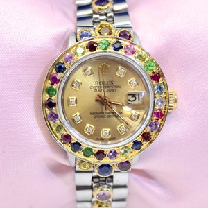 Ladies' Rolex Oyster Perpetual DateJust SS Watch 26 mm w/Rubies,Sapphires