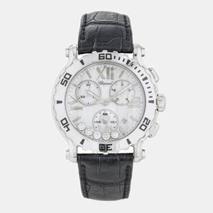 May include: A silver-toned wristwatch with a white face, featuring the brand name "Chopard". The watch has a black leather band and a bezel with black numerals. The face includes multiple sub-dials and diamond accents.