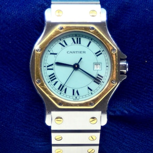 Reloj de cuarzo Cartier Santos Octagon de acero inoxidable y oro amarillo de 18 quilates con fecha