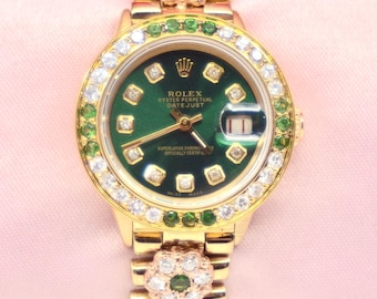 Orologio Rolex Oyster Perpetual DateJust in oro giallo 18 carati con diamanti e tsavoriti, rif. 6571