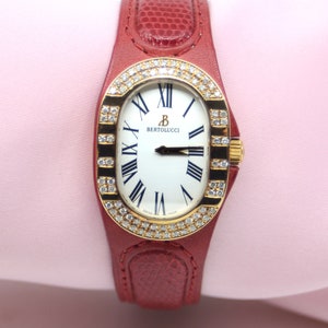 Ladies Bertolucci 18K Yellow Gold with factory Diamond Bezel Watch