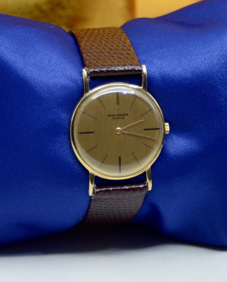 Patek Philippe Genève 18K Yellow Gold Watch - Etsy