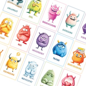 Peut inclure: Un ensemble de cartes d'émotions avec des monstres de dessins animés colorés. Chaque carte présente un monstre différent avec une expression unique et un mot allemand décrivant l'émotion, comme "Ekel" et "Trauer".