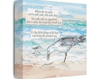 Canvas print: Seagull finds French fry on beach, watercolor style wall art
