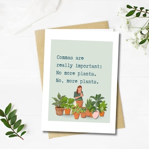 May include: A greeting card with the text "Commas are really important: No more plants. No, more plants." The card features an illustration of a person with plants in pots. The card is on a brown envelope.