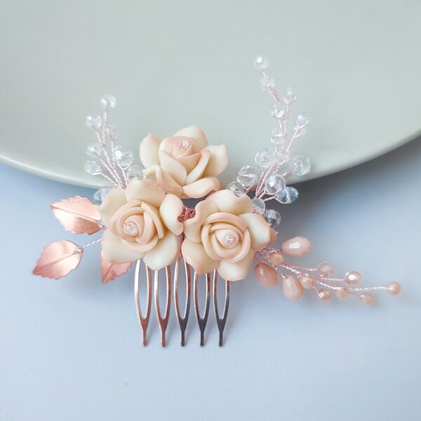 Rose gold bridal hair piece. Rose gold hair comb with blush flowers for brides.