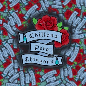 May include: A blue and white banner with the text "Chillona Pero Chingona" surrounded by red roses. The banner has a blue teardrop on each end.