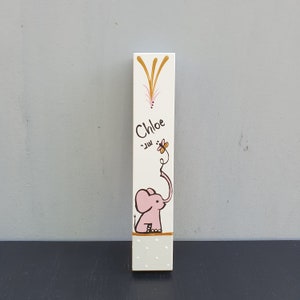 Hand painted elephant mezuzah case for girls nursery on white wood with soft pink illustration and gold accents. Personalized Jewish mezuzah for baby room, kids room decor and meaningful newborn gift with custom name in Hebrew or English.