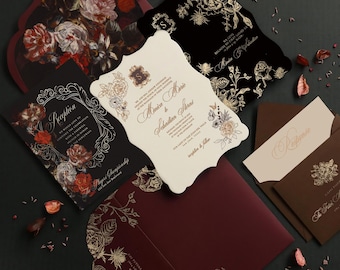 May include: Burgundy, black, and cream wedding invitation suite with gold foil accents. The invitation features a floral design and the text "Monica Morris & Sebastian Sterns". The RSVP card features the text "Response".