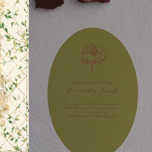 May include: An olive green oval card with a rose illustration and text. The card is set against a textured gray background, with a patterned floral design on the left and a dark burgundy ribbon at the top.
