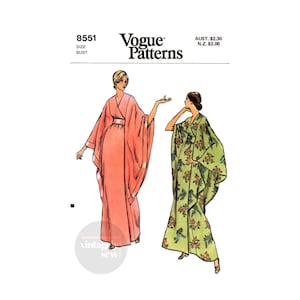 May include: Vintage Vogue sewing pattern number 8551 for a long, flowing gown. The pattern shows two women wearing the gown in different colours and fabrics. One gown is a solid pink, and the other is a green floral print.