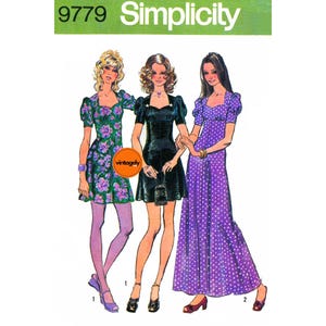 May include: Simplicity pattern 9779 showing three vintage dresses. The dresses include a floral mini dress, a black mini dress, and a purple polka dot maxi dress. The pattern is labelled "vintagely" and is on a white background.