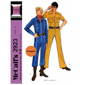 May include: A vintage sewing pattern for a men's jumpsuit. The pattern is from McCall's and is number 2923. The pattern is for a chest size of 36 inches.