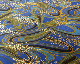 blue swirls with gold accented sprinkles legacy studio designed in hudson ohio exclusively for joann fabric and craft stores