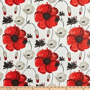 May include: Red poppy flower fabric with a white background. The fabric features a repeating pattern of red poppies with black centers and white accents.