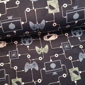 May include: Black fabric with a repeating pattern of gaming controllers, computer monitors, and other gaming-related icons. The icons are in shades of green, blue, and white.