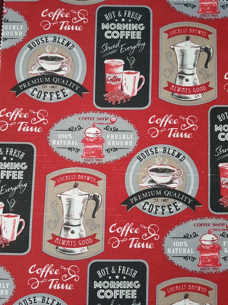 May include: Red fabric with a repeating pattern of vintage coffee shop signs. The signs feature illustrations of coffee pots, coffee cups, and coffee grinders. The text on the signs includes "Coffee Time", "House Blend", "Premium Quality Coffee", "Hot & Fresh Morning Coffee", "Locally Brewed", "Always Good", "Coffee Shop", "100% Natural", "Freshly Ground", and "Since 1950".