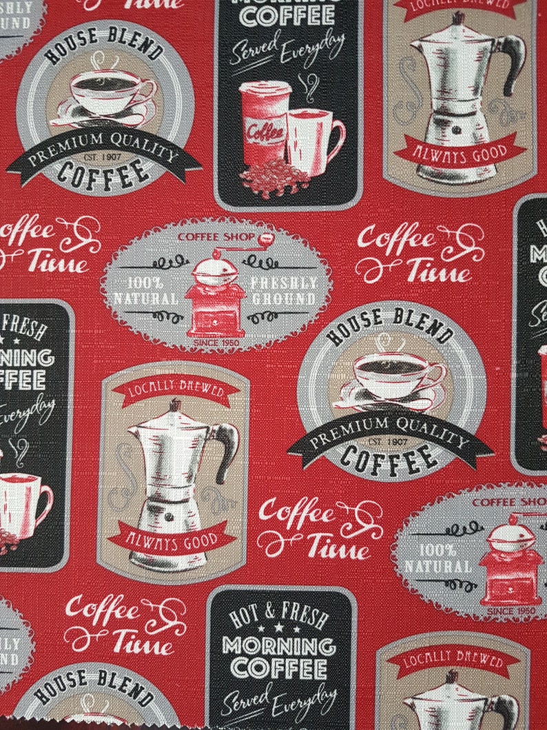 May include: Red fabric with a repeating pattern of coffee-themed illustrations. The illustrations include coffee cups, coffee beans, coffee grinders, and text that says "Coffee Time", "House Blend", "Premium Quality Coffee", "Hot & Fresh Morning Coffee", "Served Everyday", "Locally Brewed", "Always Good", and "100% Natural Freshly Ground".