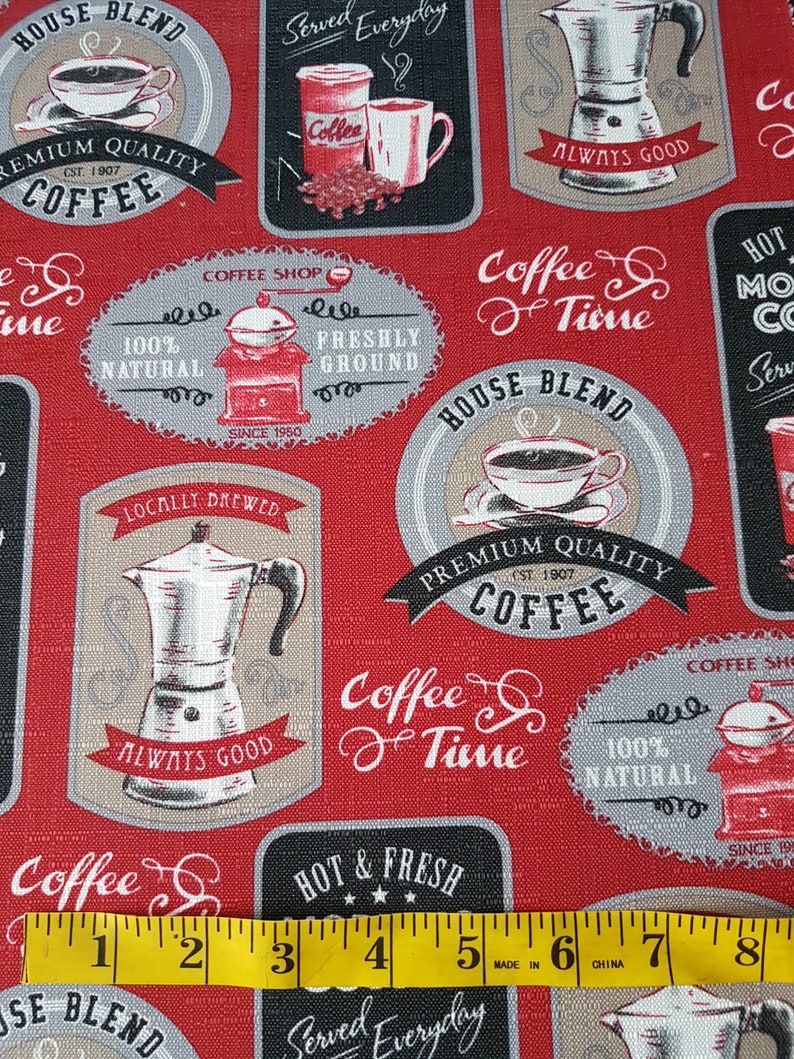 May include: Red fabric with a repeating pattern of vintage coffee-themed illustrations. The illustrations feature coffee pots, coffee cups, coffee beans, and text that says "House Blend", "Premium Quality Coffee", "Coffee & Time", "Locally Brewed", "Always Good", "Hot & Fresh", "Served Everyday", "Coffee Shop", "100% Natural", "Freshly Ground", "Since 1950".