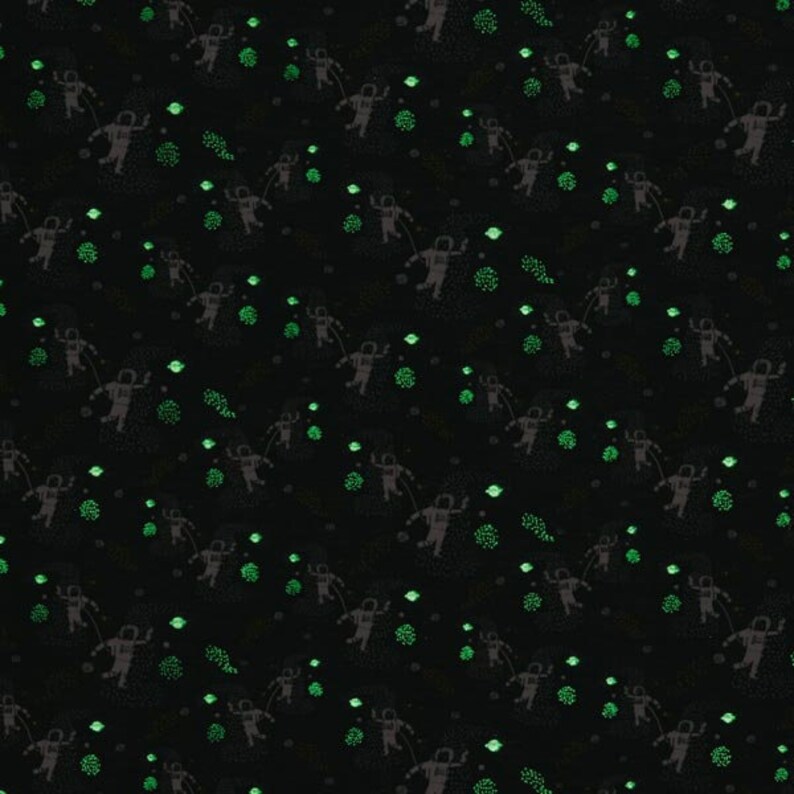 Puede incluir: Un patr&oacute;n sin costuras que presenta un dise&ntilde;o repetitivo de astronautas en un fondo negro oscuro con estrellas y planetas verdes.