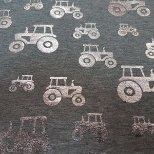 Jersey de punto con purpurina, tela plateada con diseño de bulldog y tractor Caterpillar, estampado metalizado, gris claro
