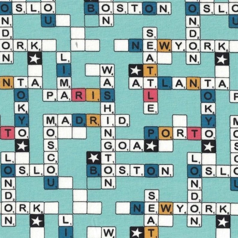 May include: A teal fabric with a crossword puzzle design featuring city names like Boston, New York, and Paris. The tiles are in various colors, including teal, orange, and black, with star accents. The overall pattern is a repeating grid.