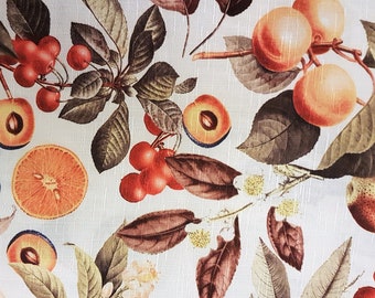 May include: A white fabric with a repeating pattern of fruit and leaves. The fruit includes oranges, plums, pears, and cherries. The leaves are in shades of brown and green.