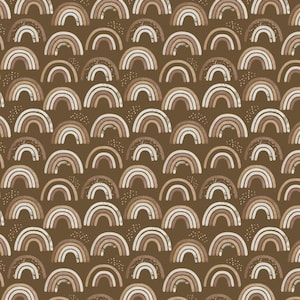 May include: A repeating pattern of stylized rainbows in shades of brown, beige, and white on a dark brown background. The rainbows have a distressed, textured appearance, and small dotted accents are scattered throughout the design. This pattern is suitable for fabric or wallpaper.