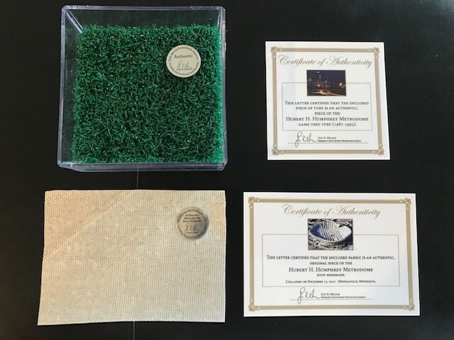 thumbnail image 2 of Heaven And Turf Authentic HHH Metrodome Artifact - Teflon Roof & Field Turf Piece 2 of 2
