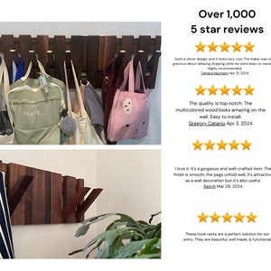 May include: A wooden wall-mounted coat rack with multiple hooks. The rack is made of dark wood with a natural finish. The rack is shown with various items hanging on it, including bags, a jacket, and a towel.