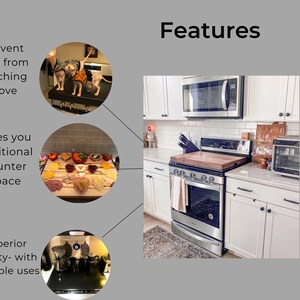 May include: A wooden chopping board sits on top of a stainless steel hob. The chopping board is surrounded by white cabinets and a white tiled splashback. The hob has a black oven door and a black knob. The chopping board is a great way to add extra counter space to your kitchen.