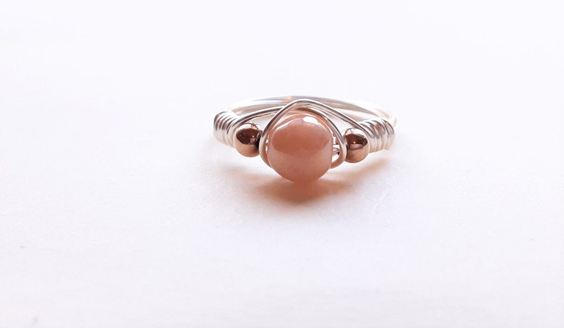 Peach moonstone and hematite wire ringdaintyringstackingring