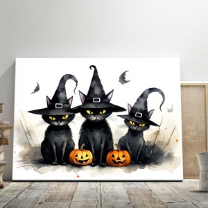 K&ouml;nnte beinhalten: Drei schwarze Katzen mit Hexenh&uuml;ten und K&uuml;rbissen in Form von Totenk&ouml;pfen. Aquarellmalerei auf wei&szlig;em Hintergrund.