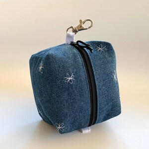 Embroidered denim boxy pouch