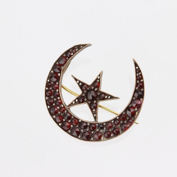 Antique star and crescent brooch with bohemian garnets. Victorian tombac jewelry.