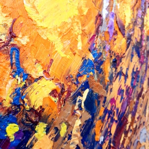 May include: Abstract painting with thick brushstrokes in shades of orange, yellow, blue, purple, and brown.