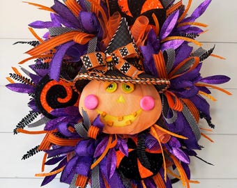 ハロウィンリース、ジャック・オー・ランタンの装飾、不気味な装飾、ウィムジクル風の装飾と紫色のデザイン