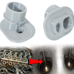 May include: Two gray plastic engine valve covers with the text "M57" on one of the covers. The covers are designed to fit over the valve stems of an engine. The image also shows a close-up of the valve stems inside an engine.