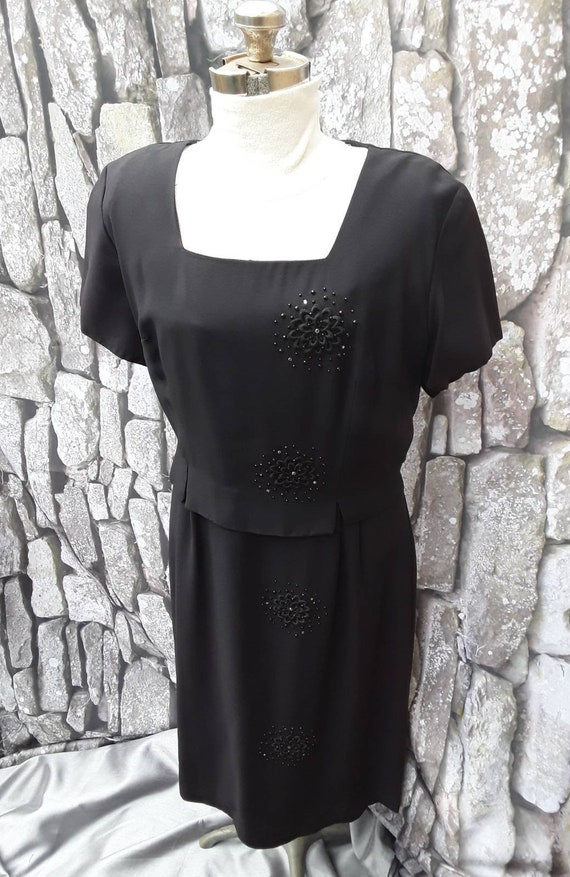 Simply beautiful large black dress with embroidere