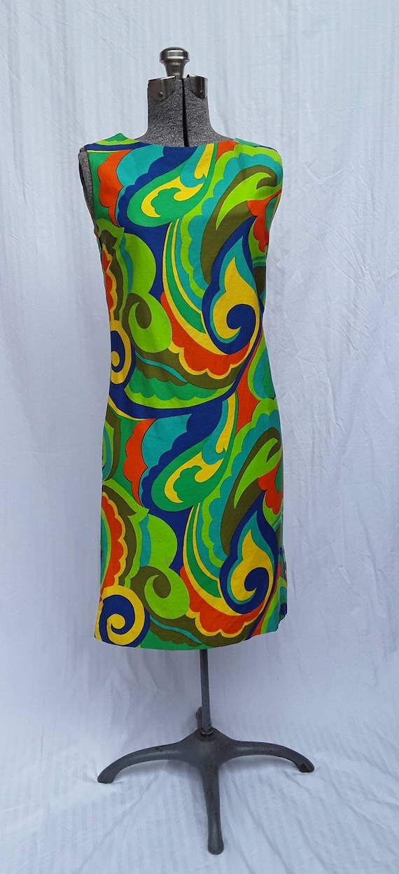 Green plus Mod 60's psychedelic patterned dress.
