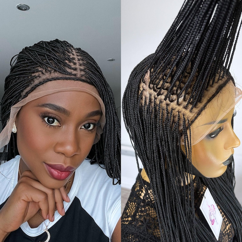 May include: A black braided wig with a lace front. The wig is styled in small braids and is parted on the side. The wig is worn by a person with dark skin.