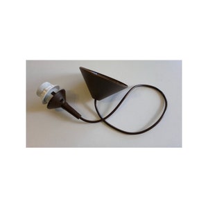 May include: A brown pendant light fitting with a cone-shaped shade and a matching cable. The fitting includes a white light bulb socket. The design is minimalist and suitable for various interior styles.